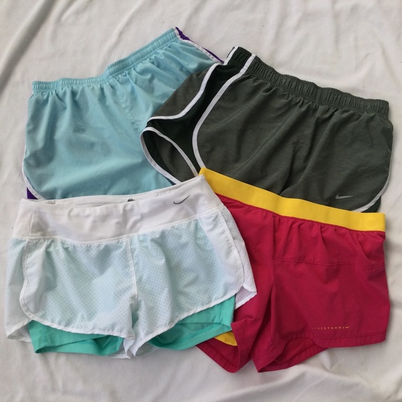 4 Pairs of Nike running shorts, 3 size medium, 1 size large - Picture 1 of 11